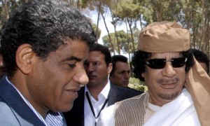 Abdullah al-Senussi (l) and Muammar Gaddafi